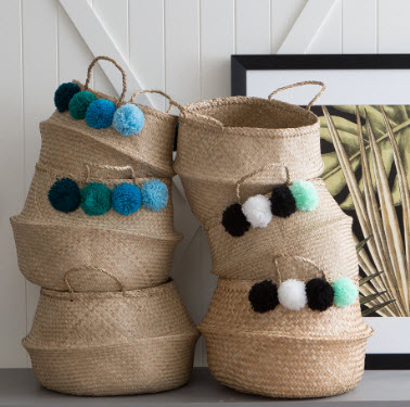 Natural round seagrass belly basket with woolen pom-pom